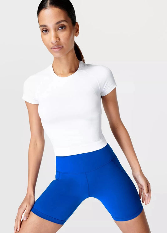 ATHLETE CROP SEAMLESS WORKOUT TEE WHITE - SWEATY BETTY